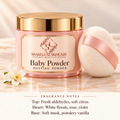 ShakeLuxe baby powder dusting powder with SL logo and fragrance notes: fresh aldehydes, soft citrus, white florals, rose, violet, soft musk and powdery vanilla.