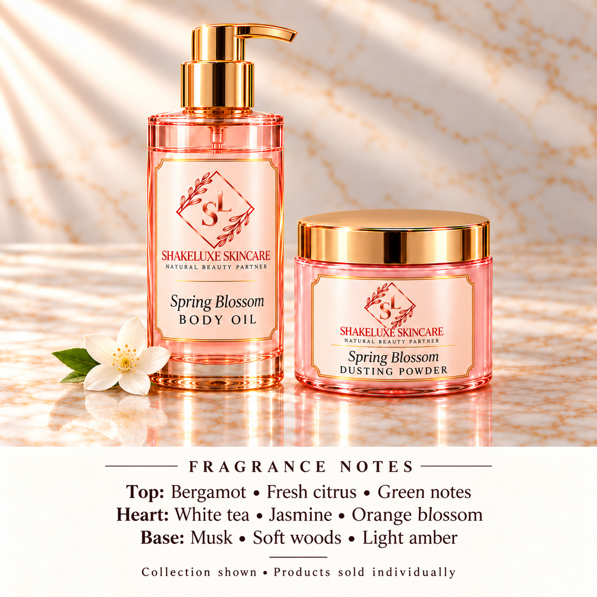 ShakeLuxe Spring Blossom body oil and dusting powder collection with SL branding and fragrance notes; products sold individually